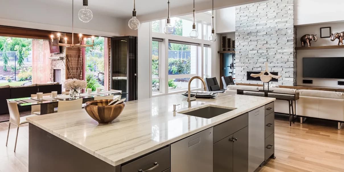 Luxury kitchen and open living room staged for top residential sale